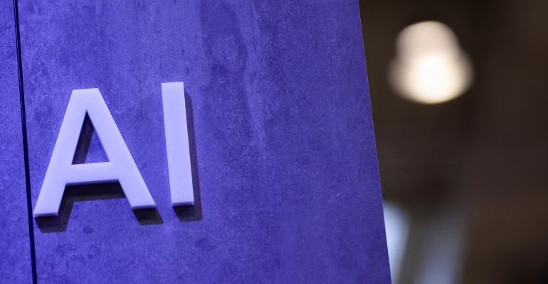 the letters AI on a purple wall