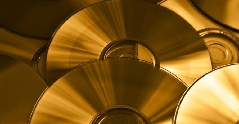 Gold CDs as background