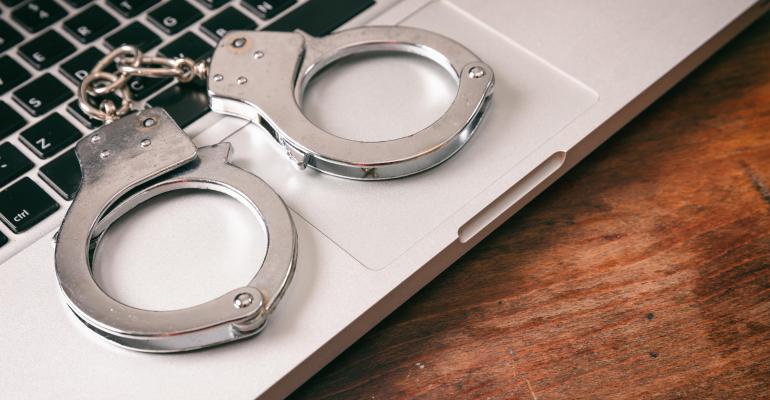 handcuffs on computer