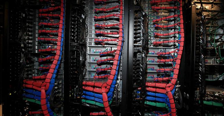 Rear view of racked servers in a data center