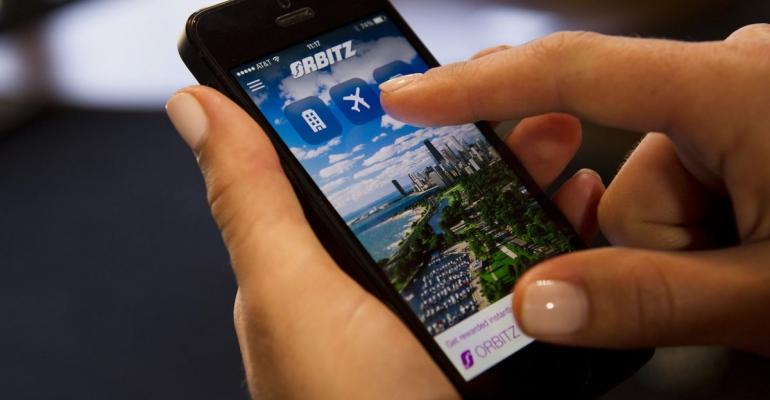 The Orbitz Worldwide Inc. application (app) is demonstrated for a photograph on an Apple Inc. iPhone 5 in San Francisco, California, U.S. Photographer: David Paul Morris/Bloomberg