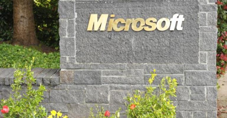 Stone sign with gold letters MICROSOFT