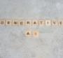 wooden letter blocks spelling out generative AI