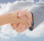 two people shaking hands in front of a cloud