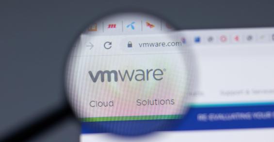 magnifying glass hovering over VMware logo
