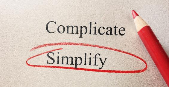 the word "simplify" circled instead of "complicate" on a sheet of paper 
