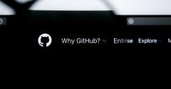 GitHub logo next to the words "Why GitHub" visible on display screen