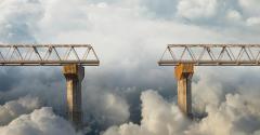 gap in a bridge in the clouds