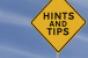 hints and tips yellow road sign