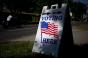 A "Voting Here" sign is displayed outside at a polling location in Davenport, Iowa, U.S., on Tuesday, June 5, 2018. Photographer: Daniel Acker/Bloomberg